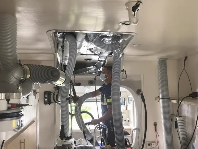 Westwood Air Duct Cleaning specialist performing precise mobile home duct cleaning in Westwood